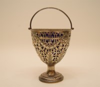 Lot 162 - An Edwardian silver swing-handled bon bon dish