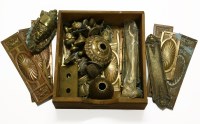 Lot 250 - A collection of copper and brass door furniture