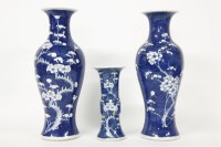 Lot 321 - Three Chinese blue and white prunus pattern vases