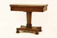 Lot 629 - A 19th century walnut fold over card table