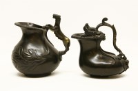 Lot 286 - Two bronze Askos type wine ewers