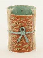 Lot 62 - A Chinese faux-marble enamelled porcelain brush pot