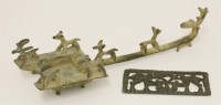 Lot 148 - A Chinese bronze candleholder