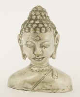 Lot 556 - A metal head of Buddha's bust