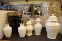 Lot 350 - A pair of blanc de chine porcelain table lamps