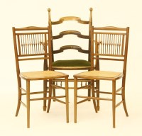 Lot 503 - An 'Arts and Crafts' Windsor ladder back chair with green padded seat and a pair of Victorian bedroom chairs with fine spindled backs