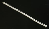 Lot 167 - An American Art Deco three stone diamond bracelet