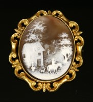Lot 63 - A Victorian gold and sea scroll cameo brooch/pendant mount