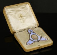 Lot 187 - A Fabergé gold and silver photograph frame