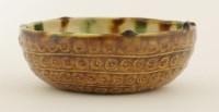 Lot 16 - A Chinese sancai pottery small bowl