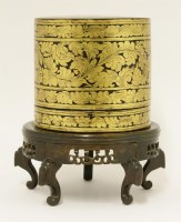 Lot 557 - A lacquered box and cover