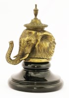 Lot 95 - An unusual brass inkwell