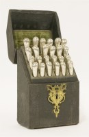 Lot 429 - A set of twenty-four 18th century silver pistol-handled knives and forks in associated fitted black fish-skin covered standing box