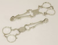 Lot 496 - Two George III silver sugar nips