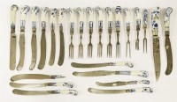 Lot 56 - A collection of cutlery with blue and white porcelain handles