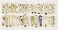Lot 58 - Thirty porcelain cutlery handles