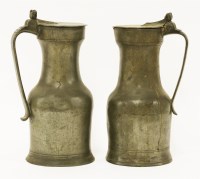 Lot 109 - Two pewter tappet hens or flagons