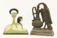 Lot 114 - Two iron doorstops