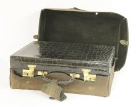Lot 115 - A crocodile skin dressing case