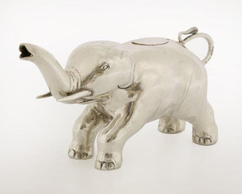 519 - A novelty Continental silver elephant cream jug