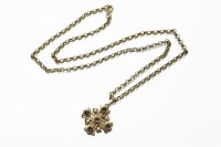 Lot 1024 - A gold five stone synthetic colour change sapphire rub set cross pendant (tested as approximately 9ct) on a gold belcher chain (tested as 9ct gold)
total 12.17g