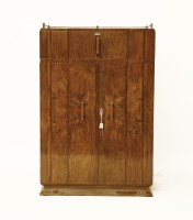 Lot 1739 - An Art Deco walnut compactum