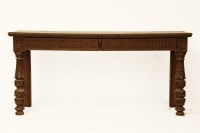 Lot 1749 - A Victorian carved oak serving table with gadrooned rectangular top on turned supports