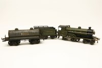 Lot 1384 - A Bing 0 Gauge three rail 4-4-0 locomotive and tender