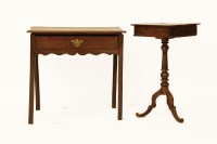 Lot 1725 - A tripod chess table