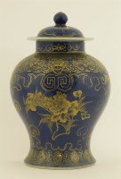 Lot 520 - A powder blue vase and cover