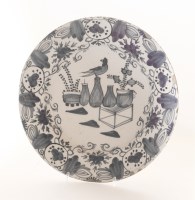 Lot 78 - A Dutch delft blue and white wall plate