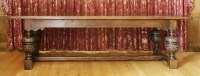 Lot 105 - An oak three-plank refectory table