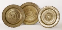 Lot 181 - Three embossed brass Nuremberg alms dishes