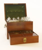 Lot 23 - A George III mahogany apothecary's cabinet