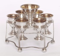 Lot 230 - A Sheffield plate six-cup egg cruet