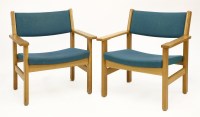Lot 1827 - A pair of oak armchairs