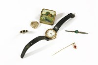 Lot 1055 - A ladies 9ct gold mechanical watch with white enamel dial and Arabic numerals