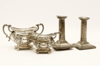 Lot 1165 - A pair of hallmarked silver dwarf candlesticks