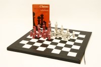 Lot 1211 - A late 19th century ivory and stained ivory chess set