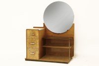 Lot 1689 - An Art Deco walnut mirror backed dressing table with a smoked glass shelf