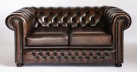 Lot 52 - A pair of modern brown leather two-seat chesterfield settees