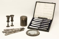 Lot 1179 - A collection of silver handled butter knives