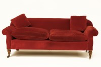 Lot 1683 - A Victorian overstuffed sofa