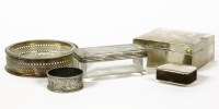 Lot 136 - A silver bottle coaster