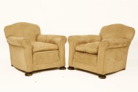 Lot 711 - A pair of 1920's club armchairs