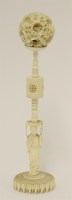 Lot 201 - A Canton ivory ball and stand