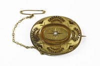 Lot 1 - A Victorian Etruscan style oval shield brooch