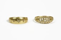 Lot 20 - An 18ct gold three stone star set diamond ring (shank cracked)