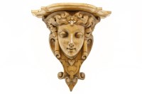 Lot 321 - A carved walnut wall bracket