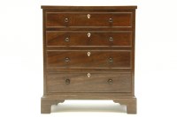 Lot 261 - A miniature mahogany chest of drawers